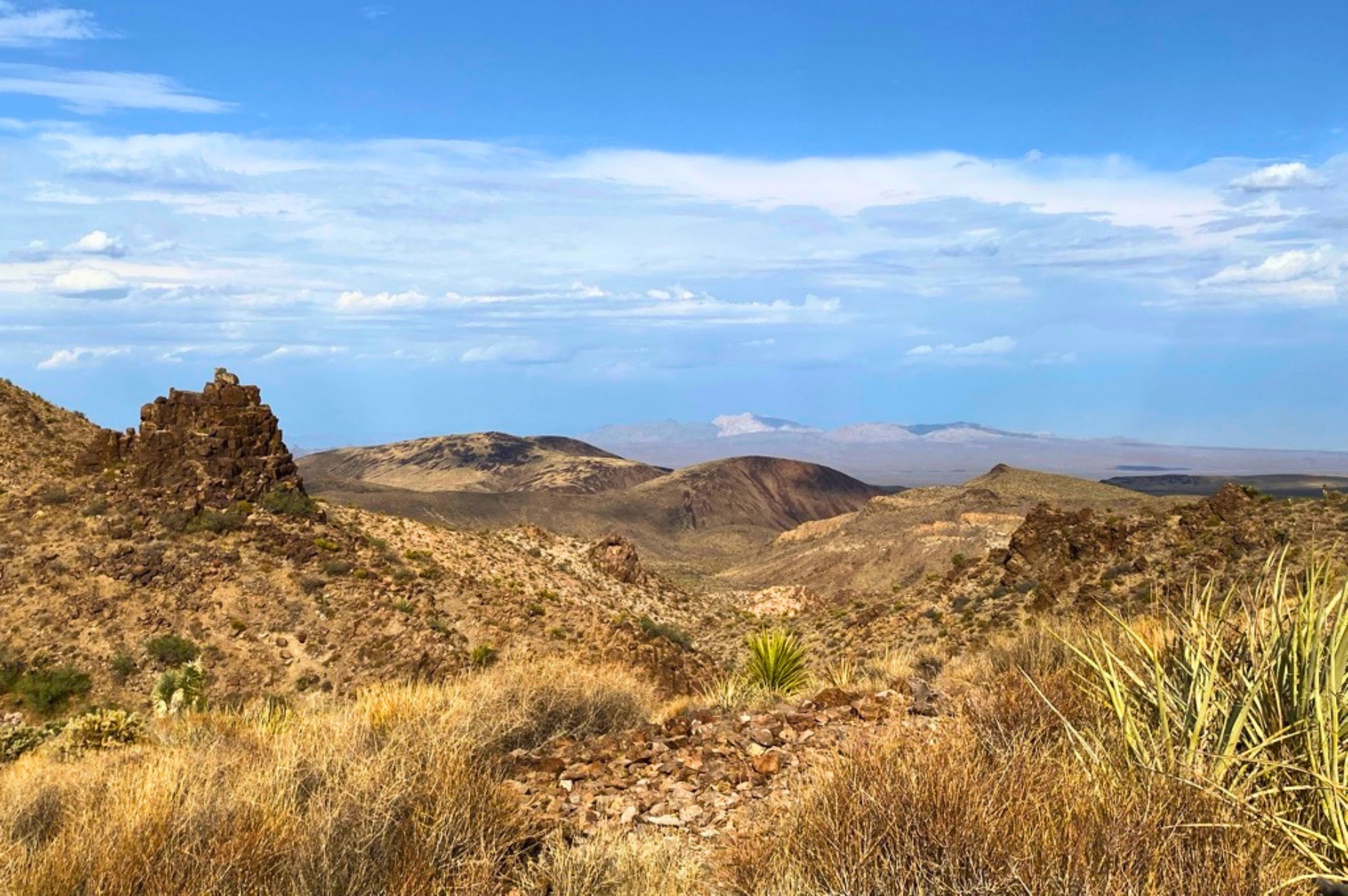 A daytime image of the rocky Castle Mountains in California. Blue sky and rock ledges. A daytime image of the rocky Castle Mountains in California. Blue sky and rock ledges.